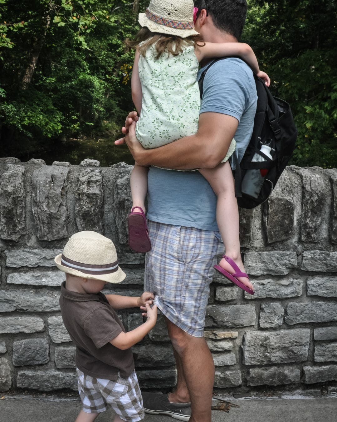 Man with children showing who's affected by an unhappy worklife