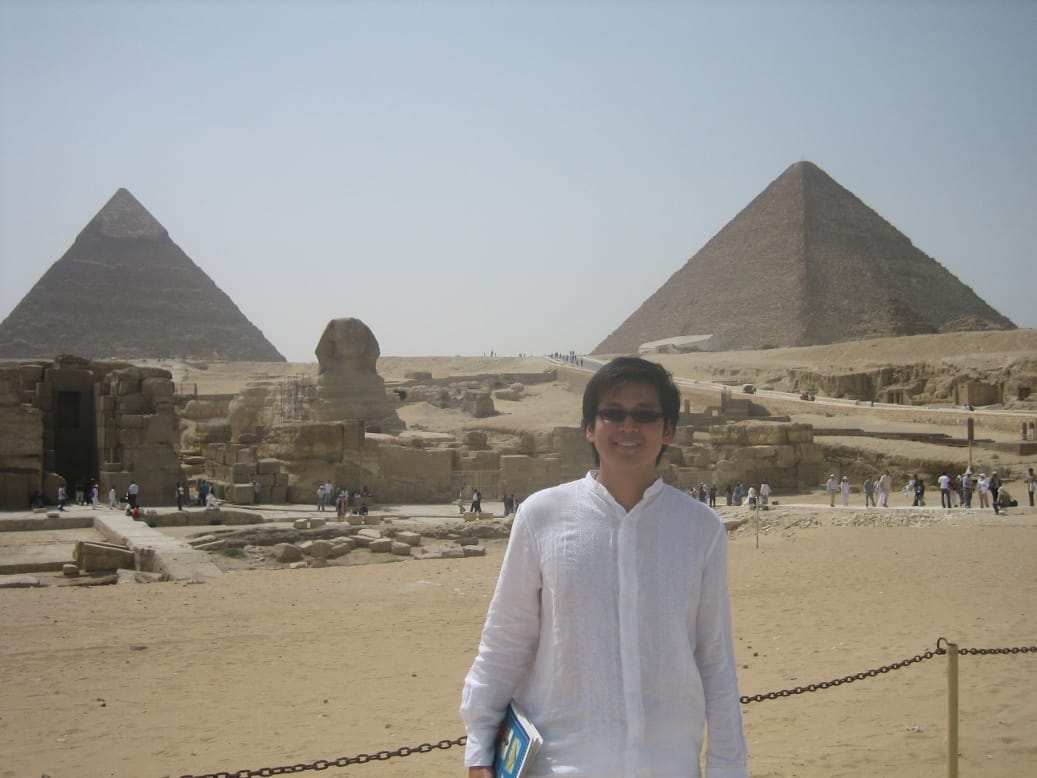 Standing before the pyramids during a spiritual journey to Egypt — a place that reminded me of the ancient stillness that lives in all of us.