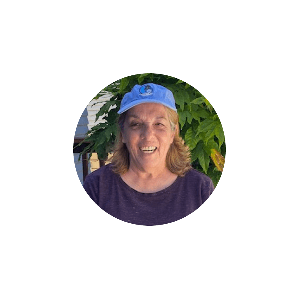 Photo of Caroline S. from Alameda, CA, showing a smiling woman with dark hair, providing a five-star testimonial praising Fabiola for going above and beyond to help her pet feel comfortable by visiting multiple times for proper introduction.