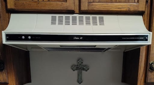 Formica backsplash to be kept behind cooktop
