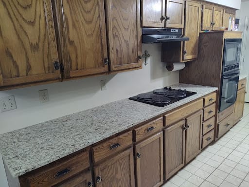 Cherry wood dining set arranged in the grand room