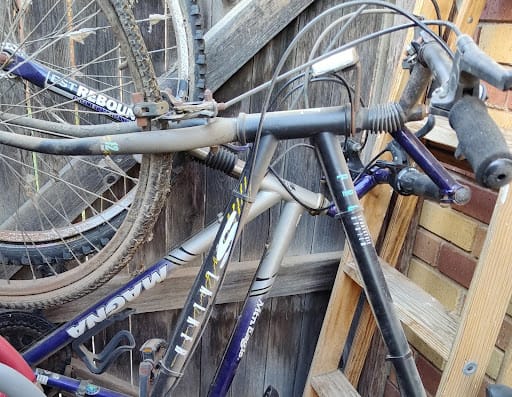 Kitchen before remodel with laminate counters and 11.5″ bar overhang