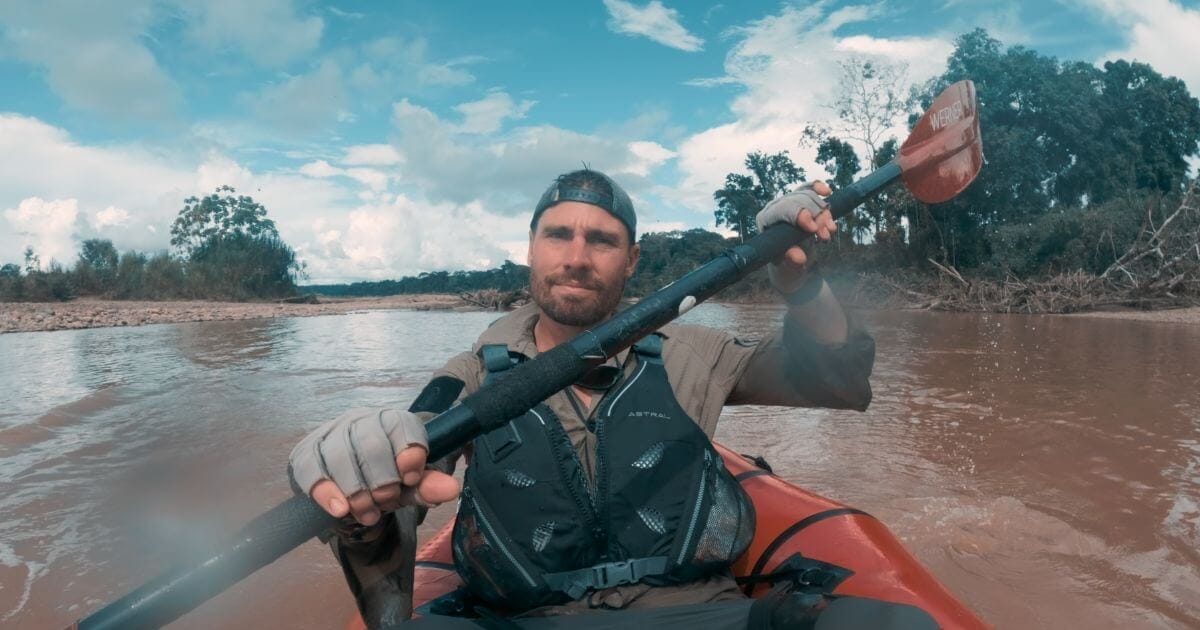 Man kayaking alone on an adventure in the jungle