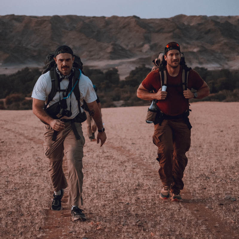 François de Neuville in front of a waterfall in the jungle of Mexico