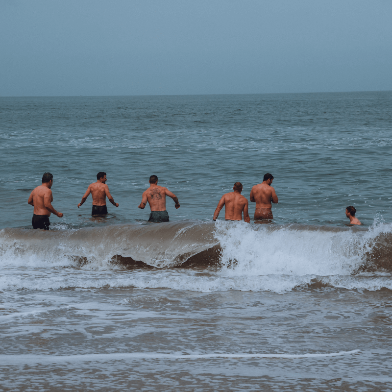 Men rock climbing pushing their limits