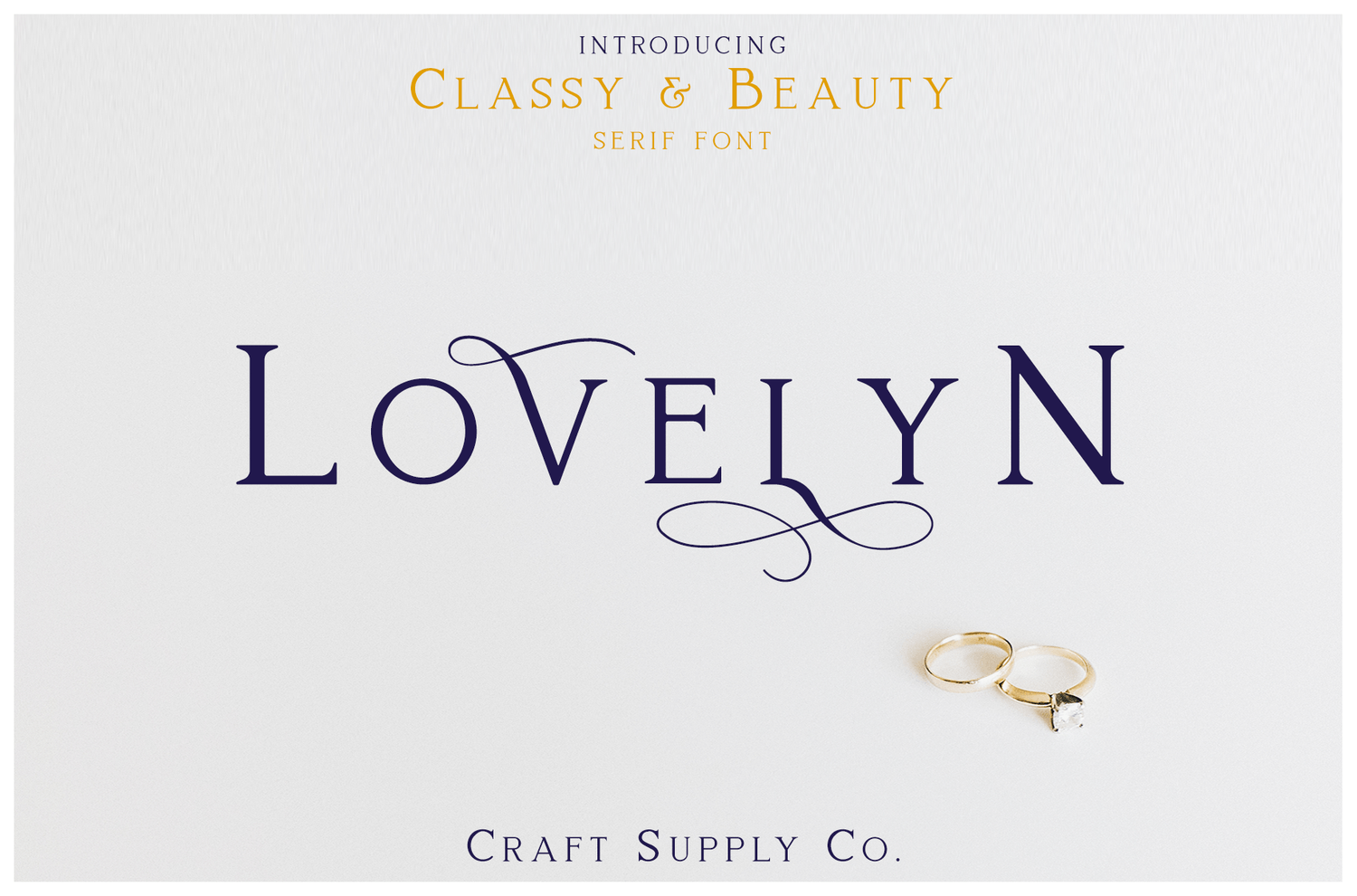 Lovelyn classy and beauty serif font introduction banner by Craft Supply Co. featuring elegant swashes on the letters V and Y, shown alongside a gold wedding ring set.