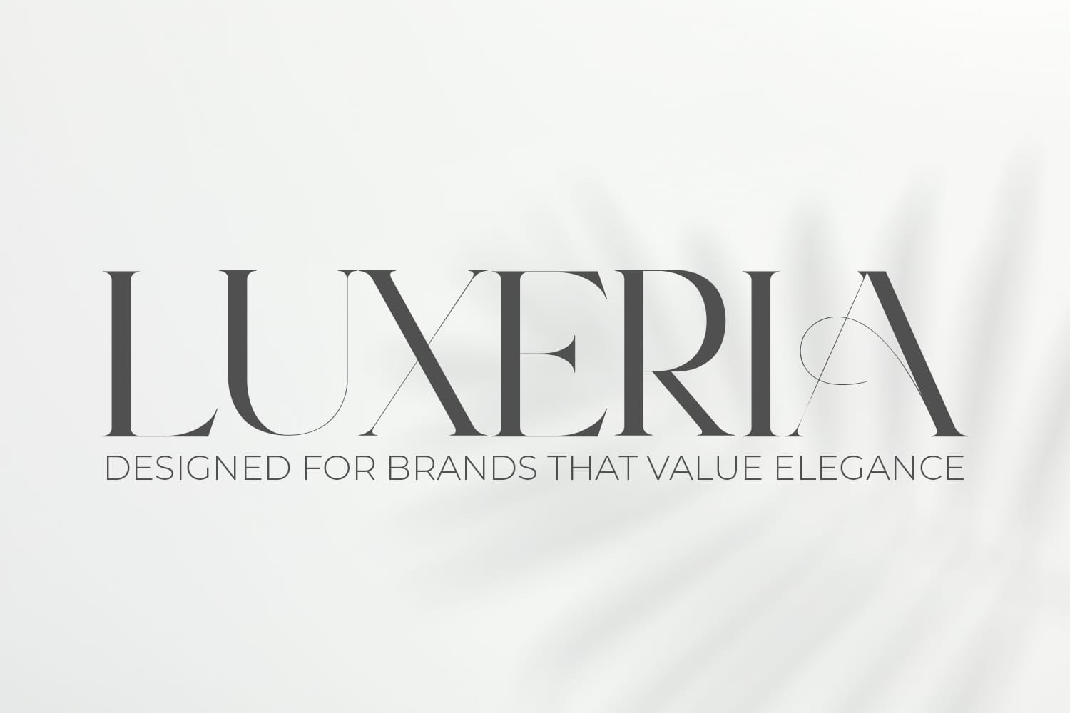 Luxeria elegant serif display font logo banner featuring the tagline designed for brands that value elegance with soft palm leaf shadow overlays on a white background.