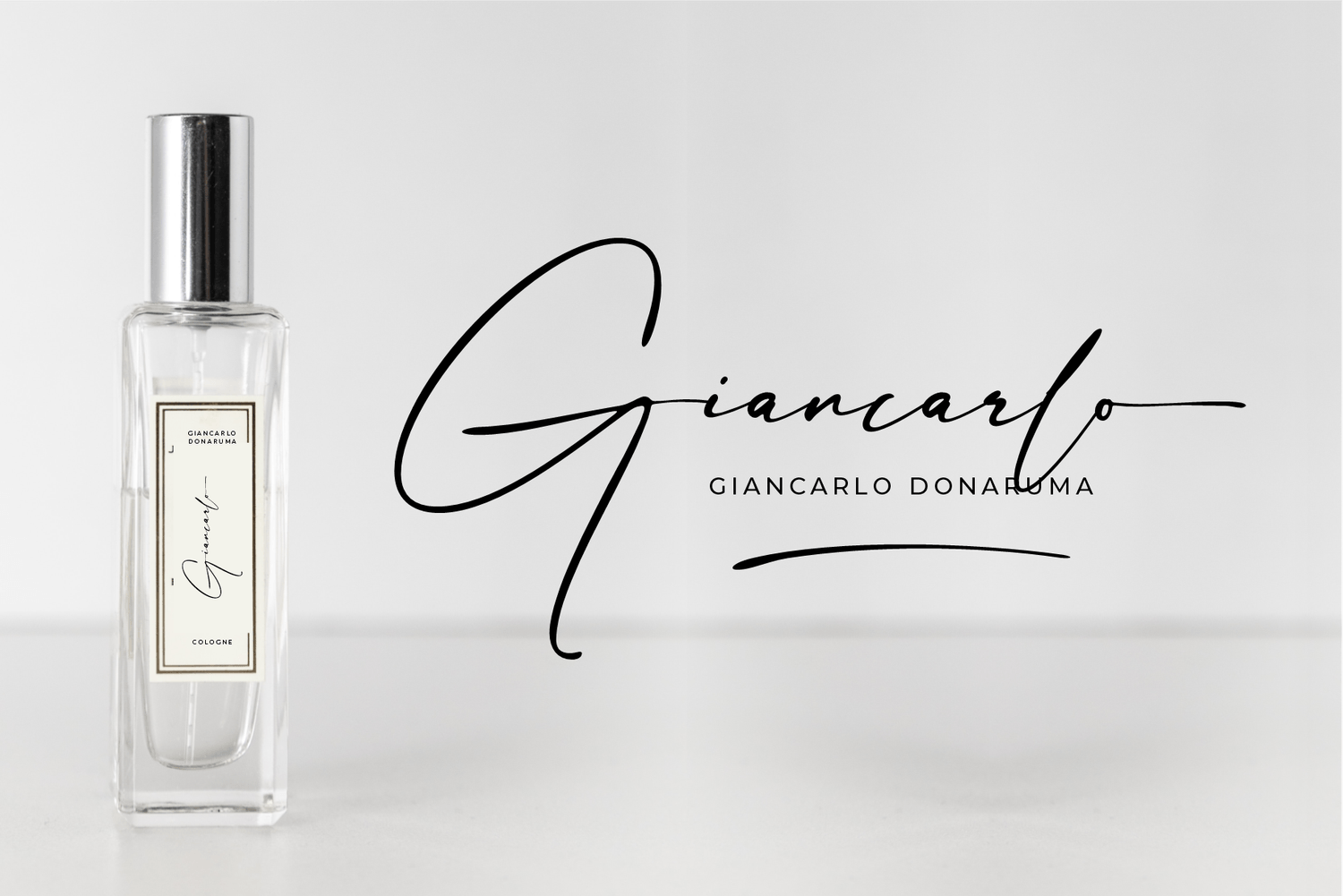 Oversized signature-style script font used in a luxury cologne brand logo