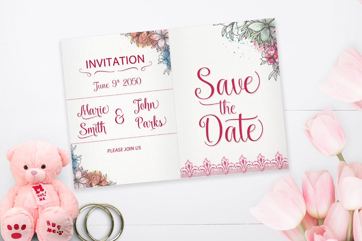 Formal calligraphy script font on a floral wedding invitation and save-the-date card