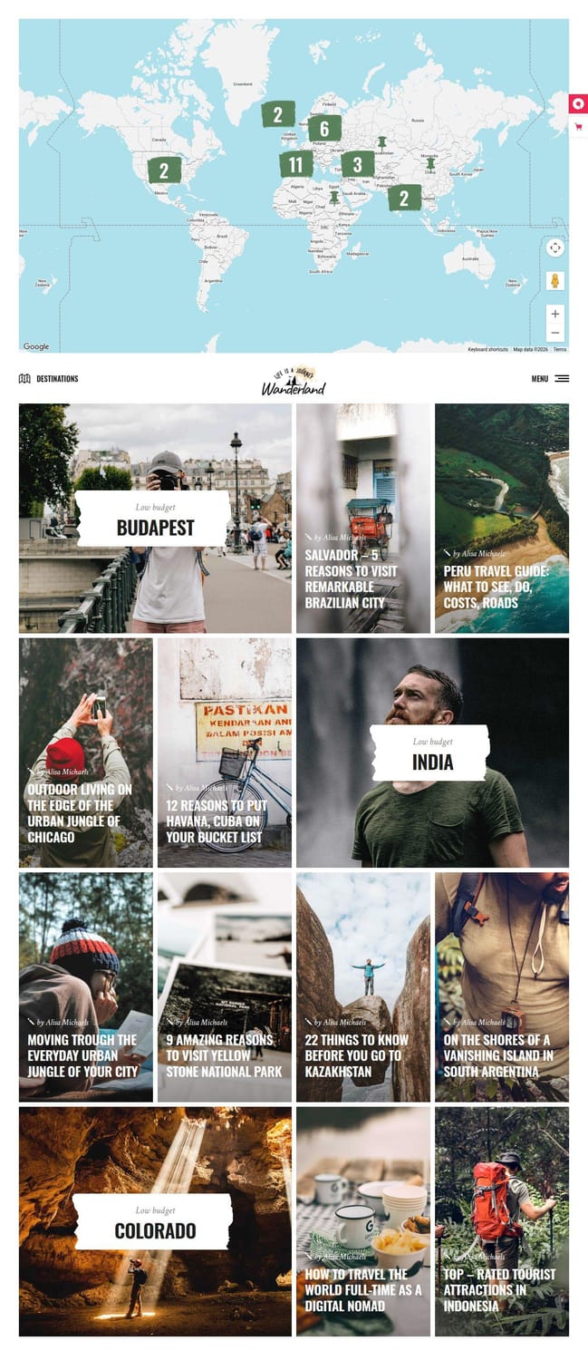 Wanderland theme Travel Blog Metro layout with an interactive world map of pinned destinations and a masonry grid of travel posts
