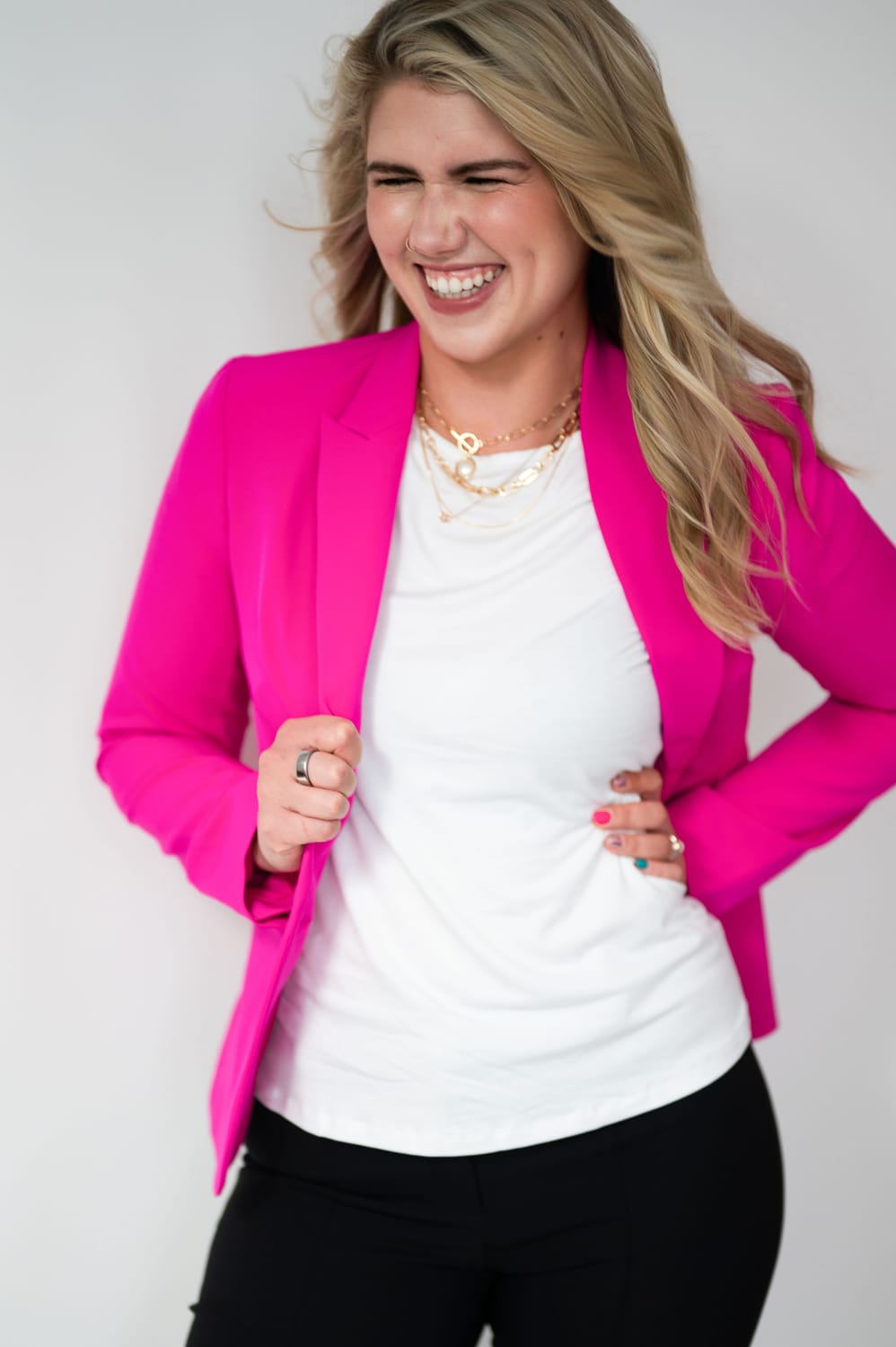Burnout recovery coach, Mary, speaking on stage in Las Vegas