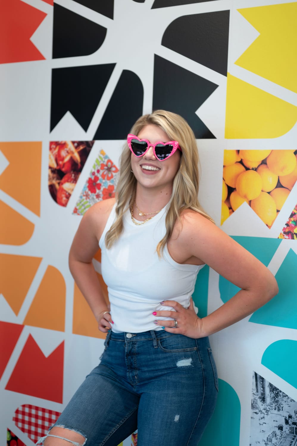 Healthcare burnout coach Mary Hodson wearing pink sunglasses