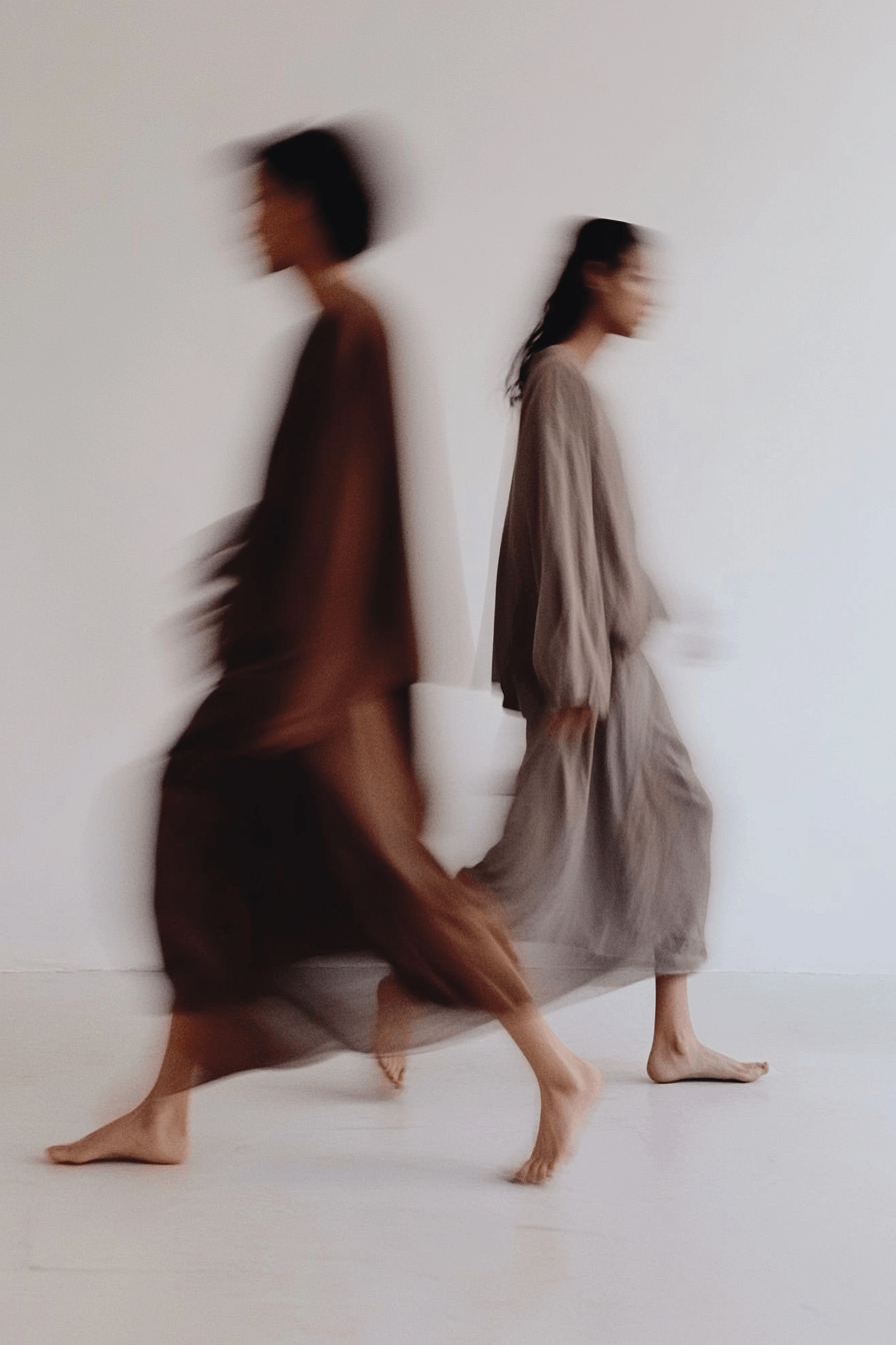 Premium stock image from skinny CReated showing two women walking in opposite directions with motion blur, calm and earthy colors
