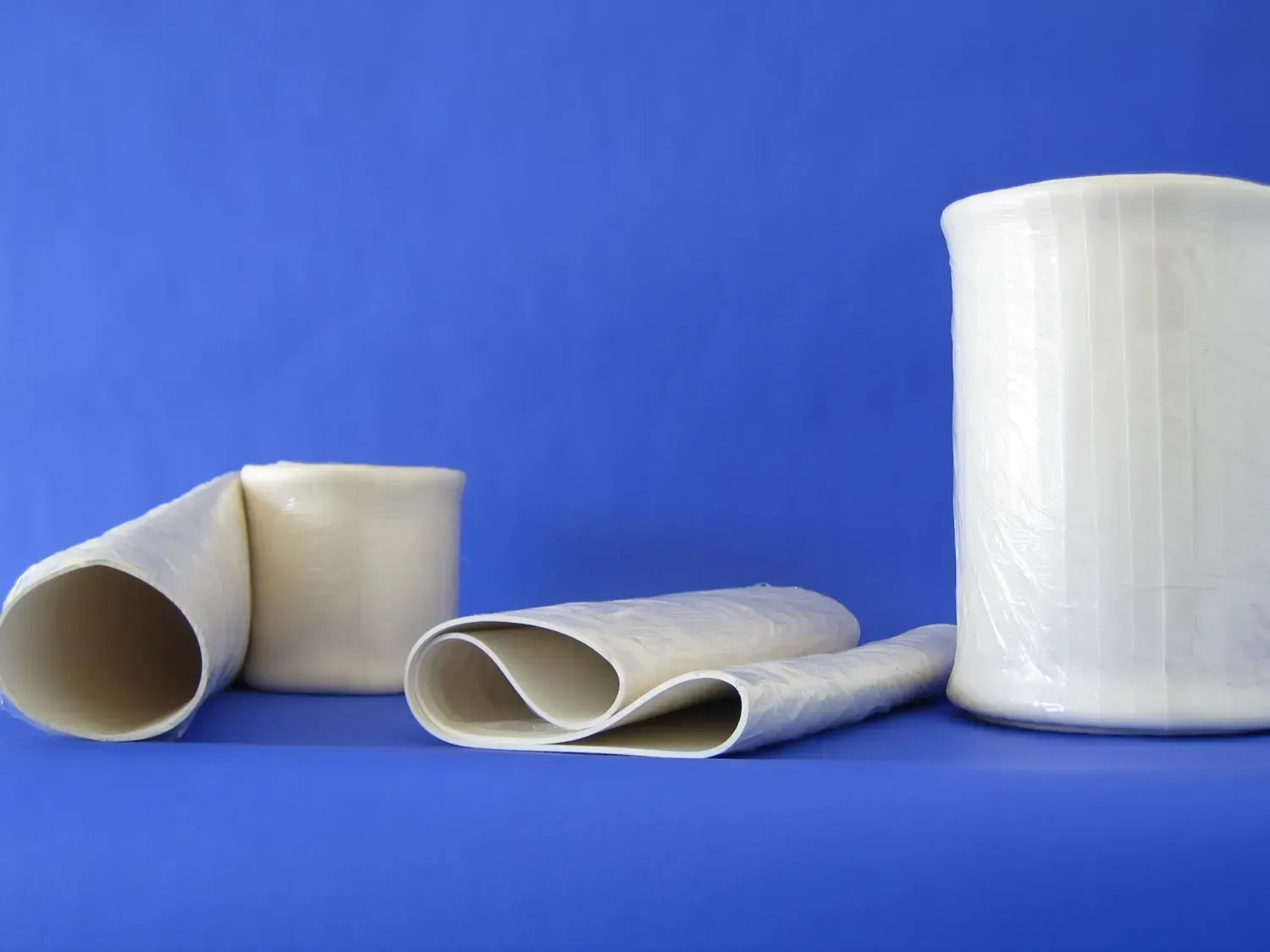 Mangas de hule blancas sin costuras