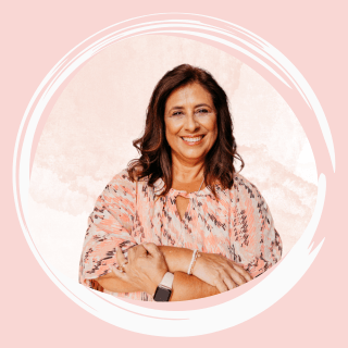 Janet with arms folded and logo and words let's connect