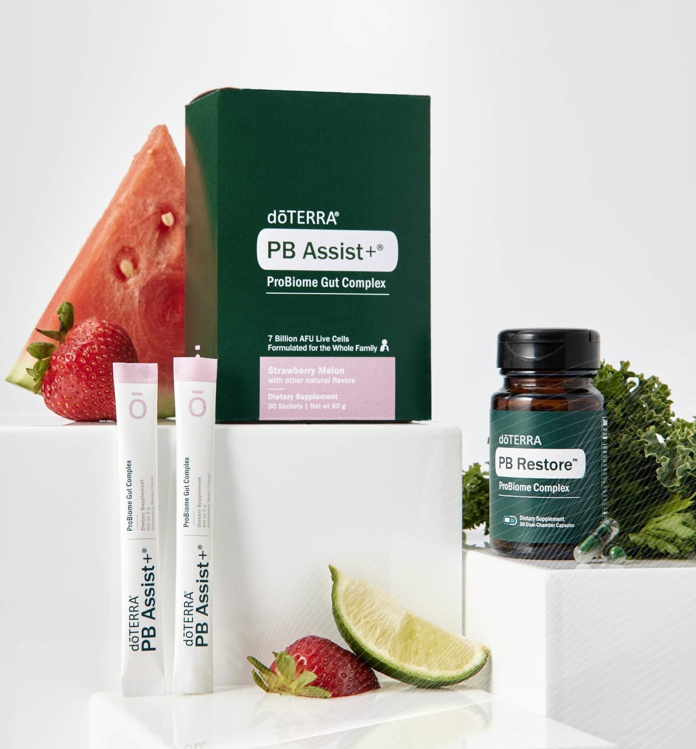 essential oils probiotic pb restore and pb assist supplements  displayed with fruit 