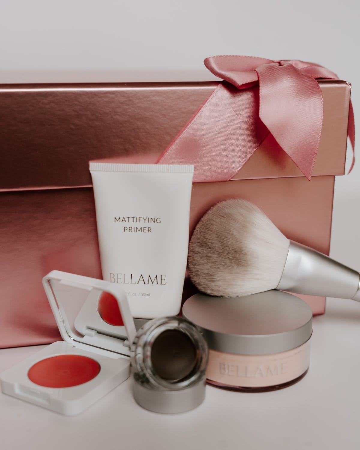 October beauty box of lipstick and eye shadow palette with eyeliner