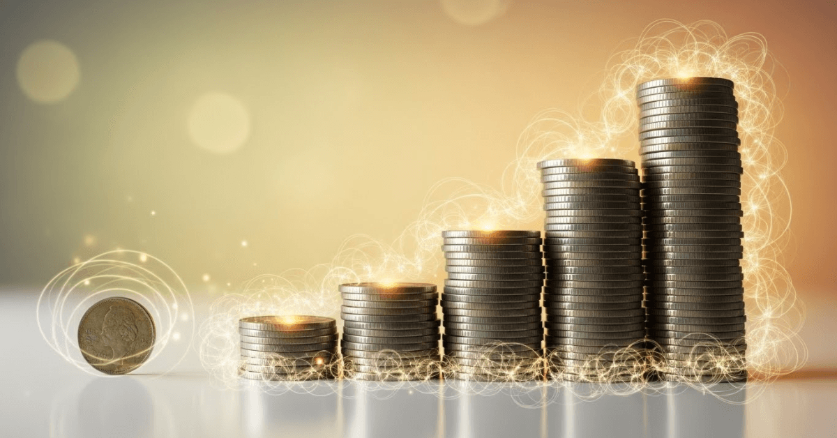 Stacks of coins increasing in height with glowing energy, symbolizing how small daily money habits compound over time to create long-term wealth and financial freedom.