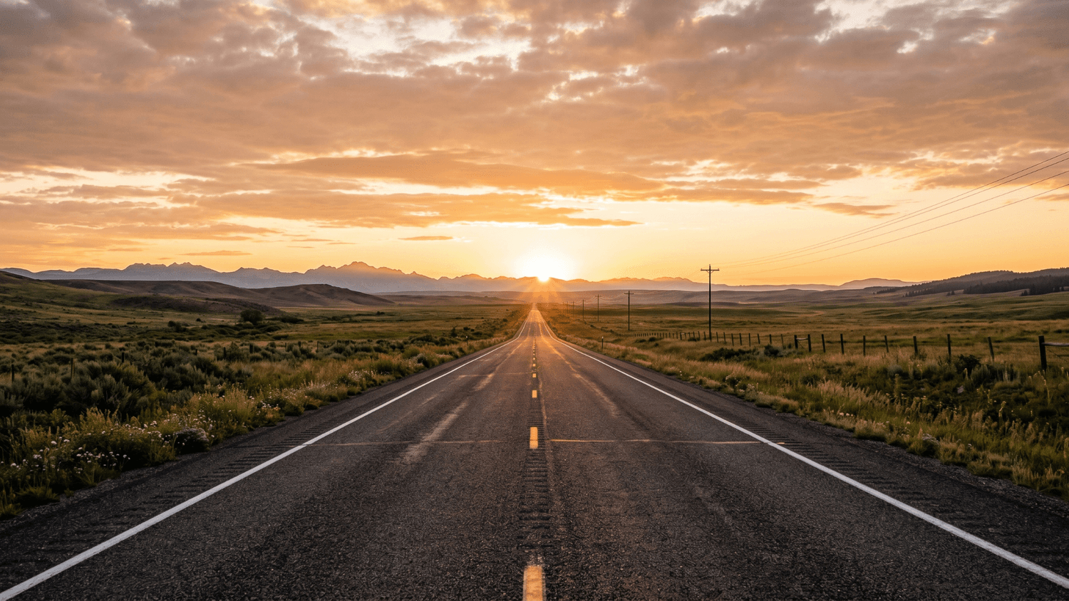 A long open road stretching into the horizon at sunrise, symbolizing freedom, direction, and future possibilities