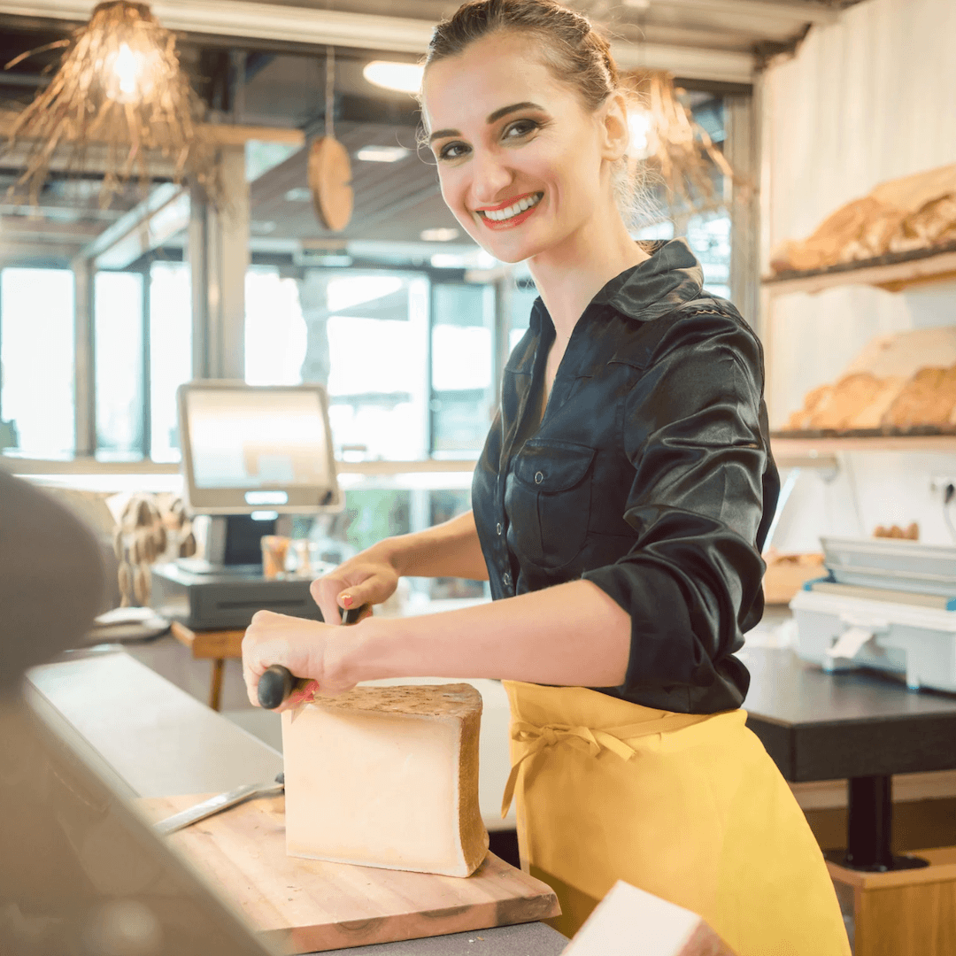 Retail Sales Success ebook cover – your complete guide to mastering retail sales skills, customer interactions, and sales growth woman slices block of cheese