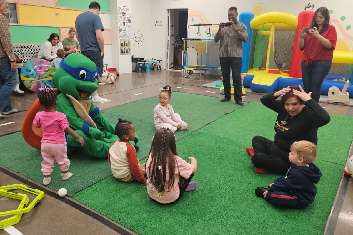 Families enjoying a special event at Kitten's Korner