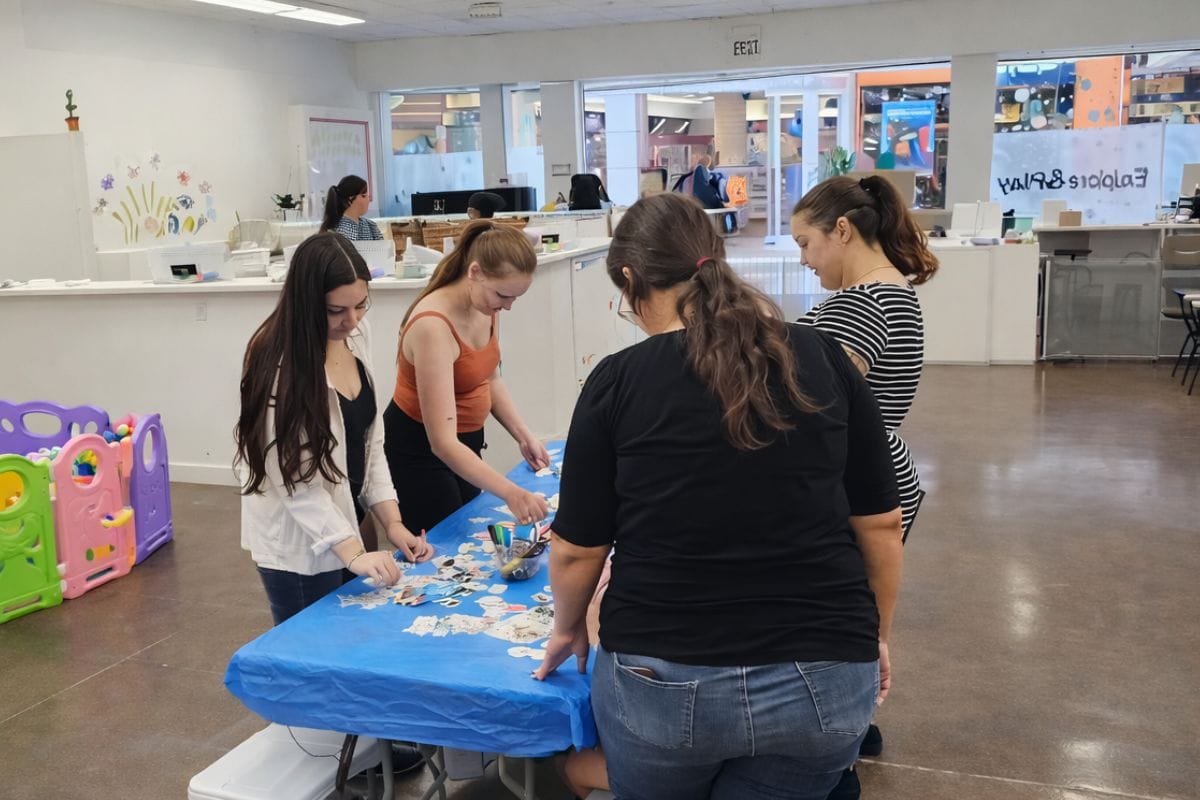 Parents crafting together at Kitten's Korner