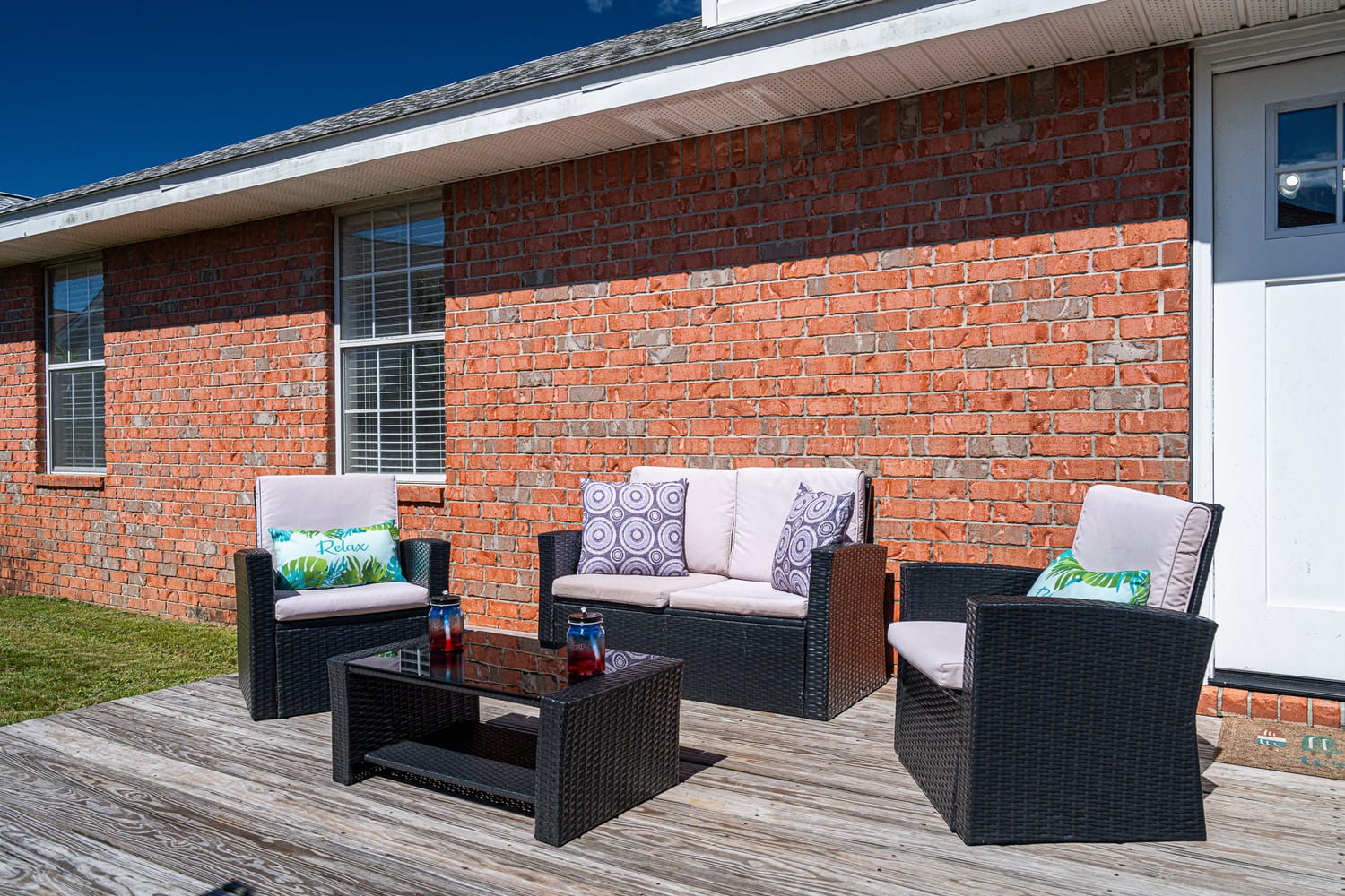 Windstarr Destin vacation rental private backyard with seating