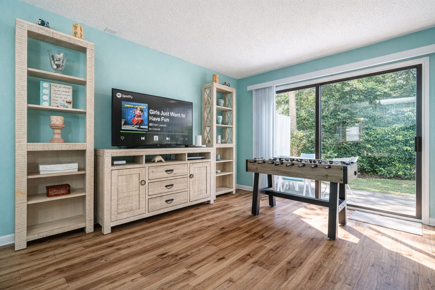 South bay by the gulf living room with tv and foosball table