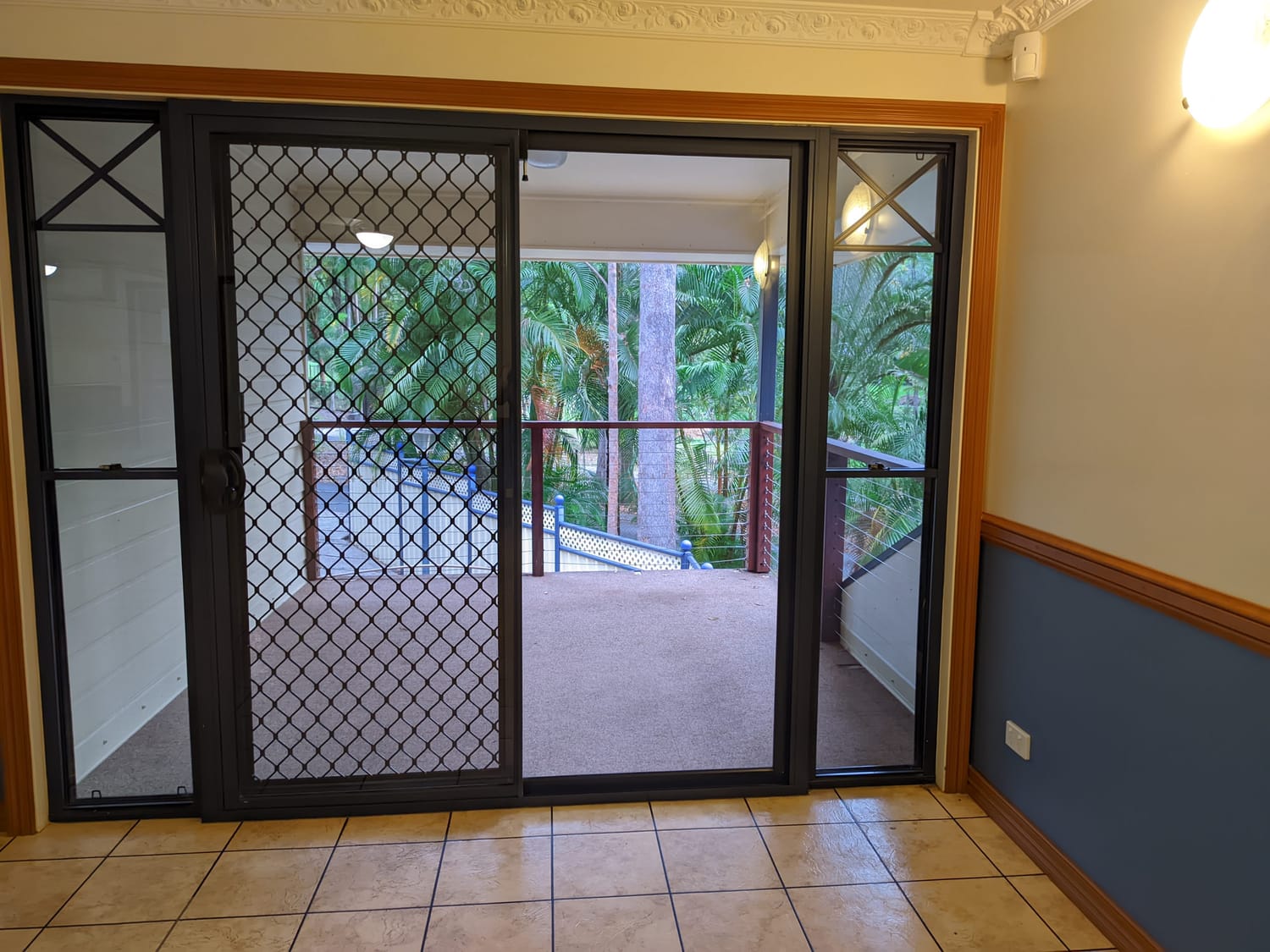 Upper-level balcony and leafy outlook