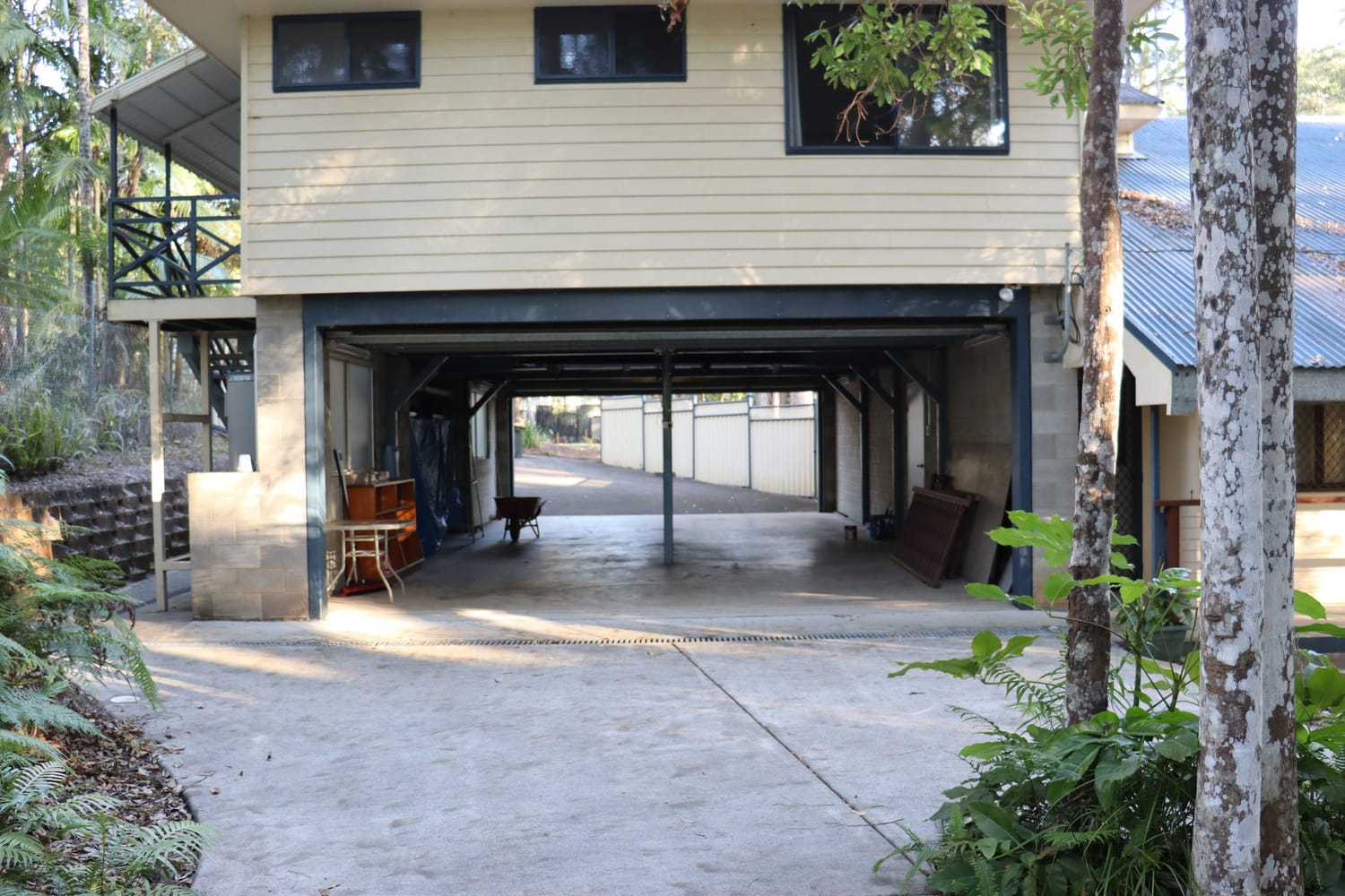 Four-bay middle-level garage with doors open