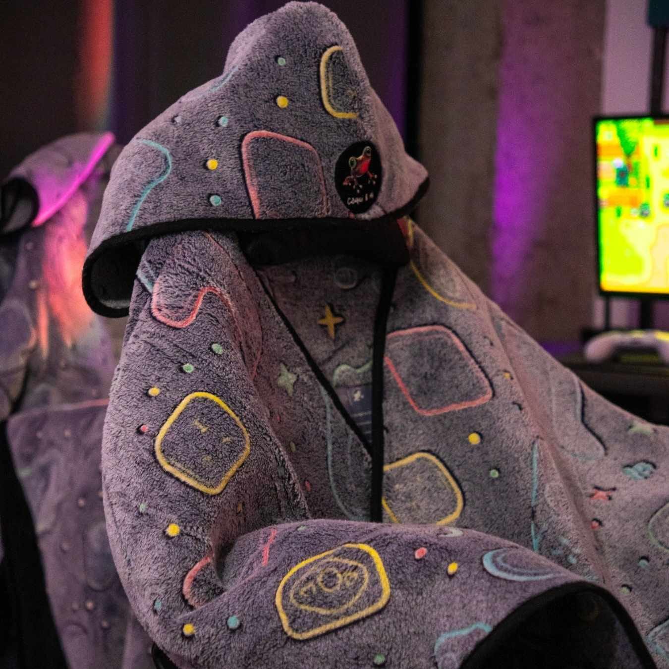 Close-up of The LEVEL UP WRAP gaming chair blanket straps and design