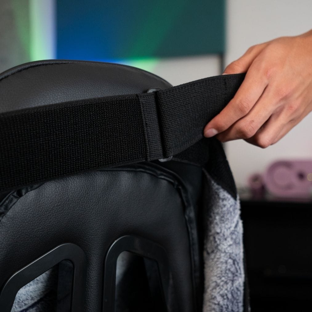 Close-up of The LEVEL UP WRAP gaming chair blanket straps and design