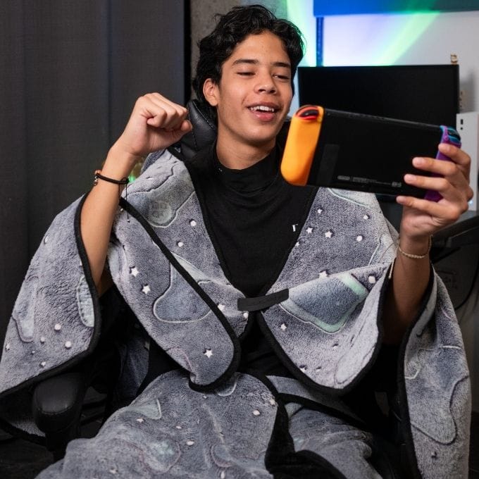Close-up of The LEVEL UP WRAP gaming chair blanket straps and design
