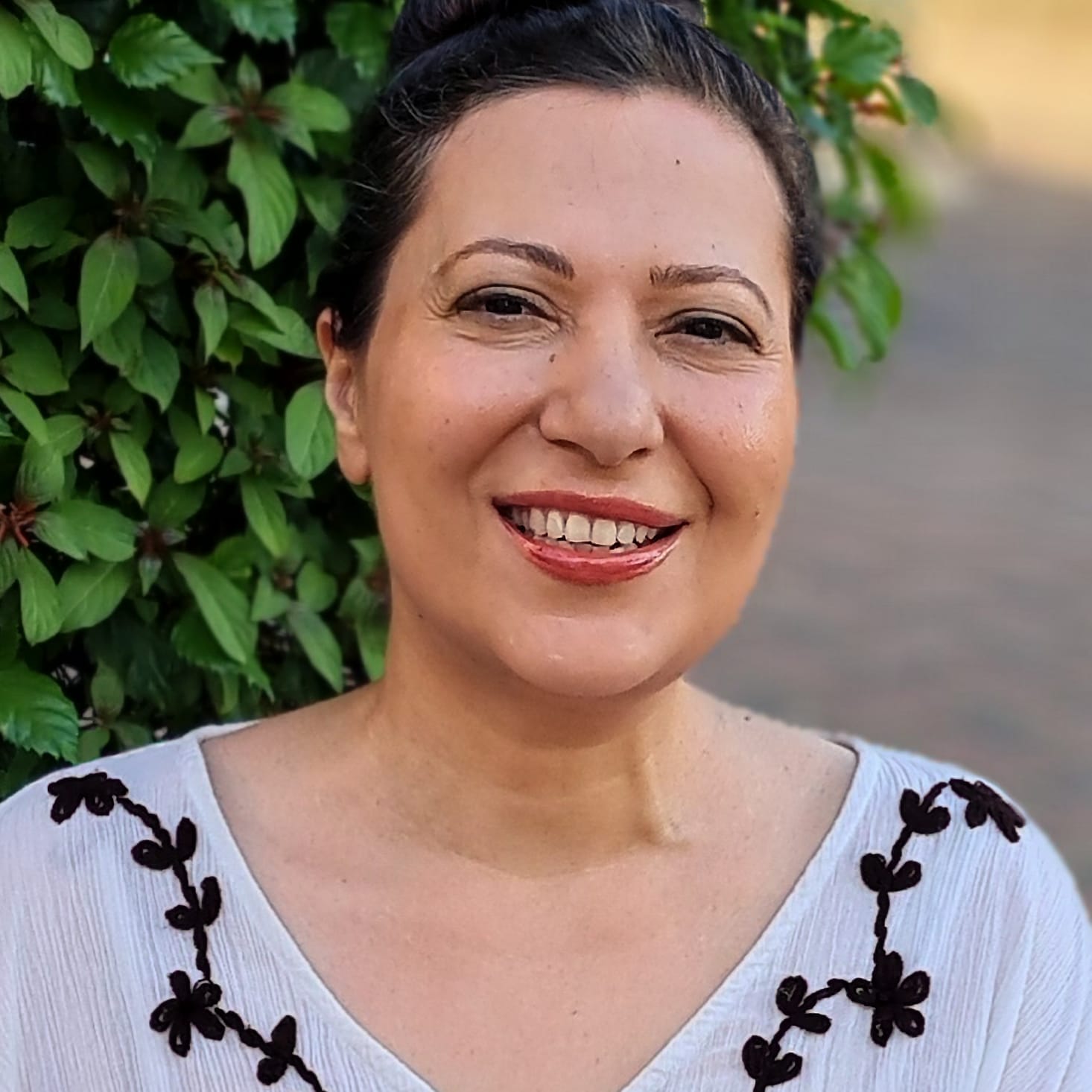 photo of Zeina Haddad, author of cookbook series "my mama know best" and creator of website at zeinacooks.com.