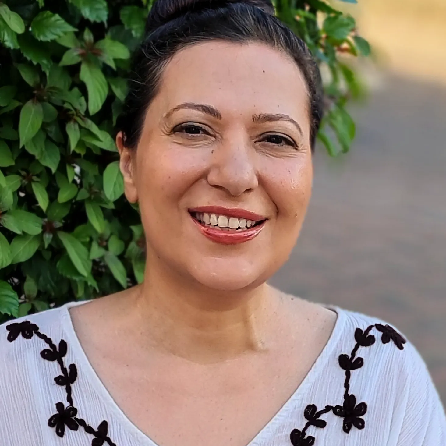 photo of Zeina Haddad, author of cookbook series "my mama know best" and creator of website at zeinacooks.com.