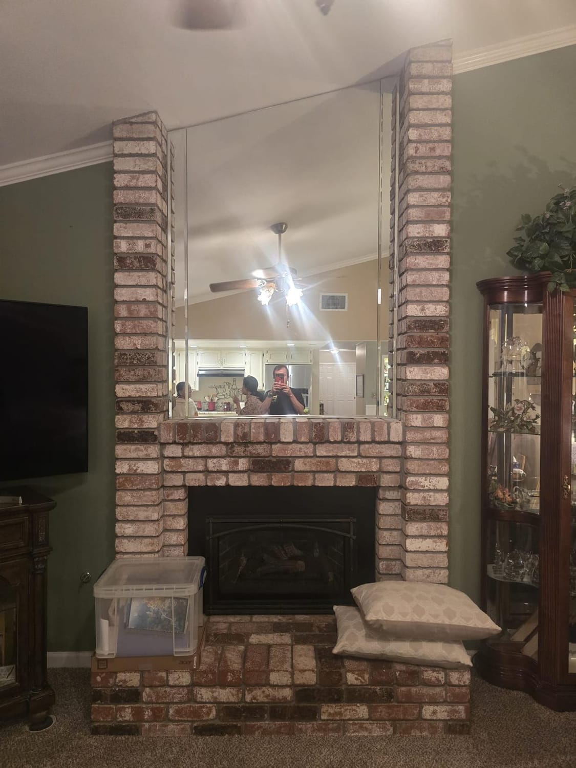 Before renovation - original brick fireplace