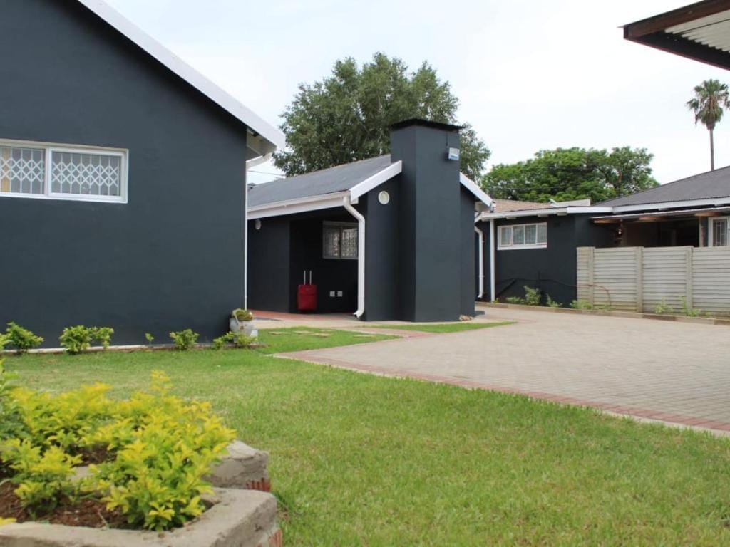 Room amenities including TV and Wi-Fi at Thully Guesthouse