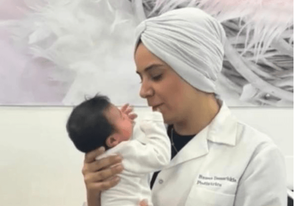 Pediatrician reviewing newborn feeding and weight concerns with parent in Kids Health Journey Clinic by Dr. Rawan Demachkie