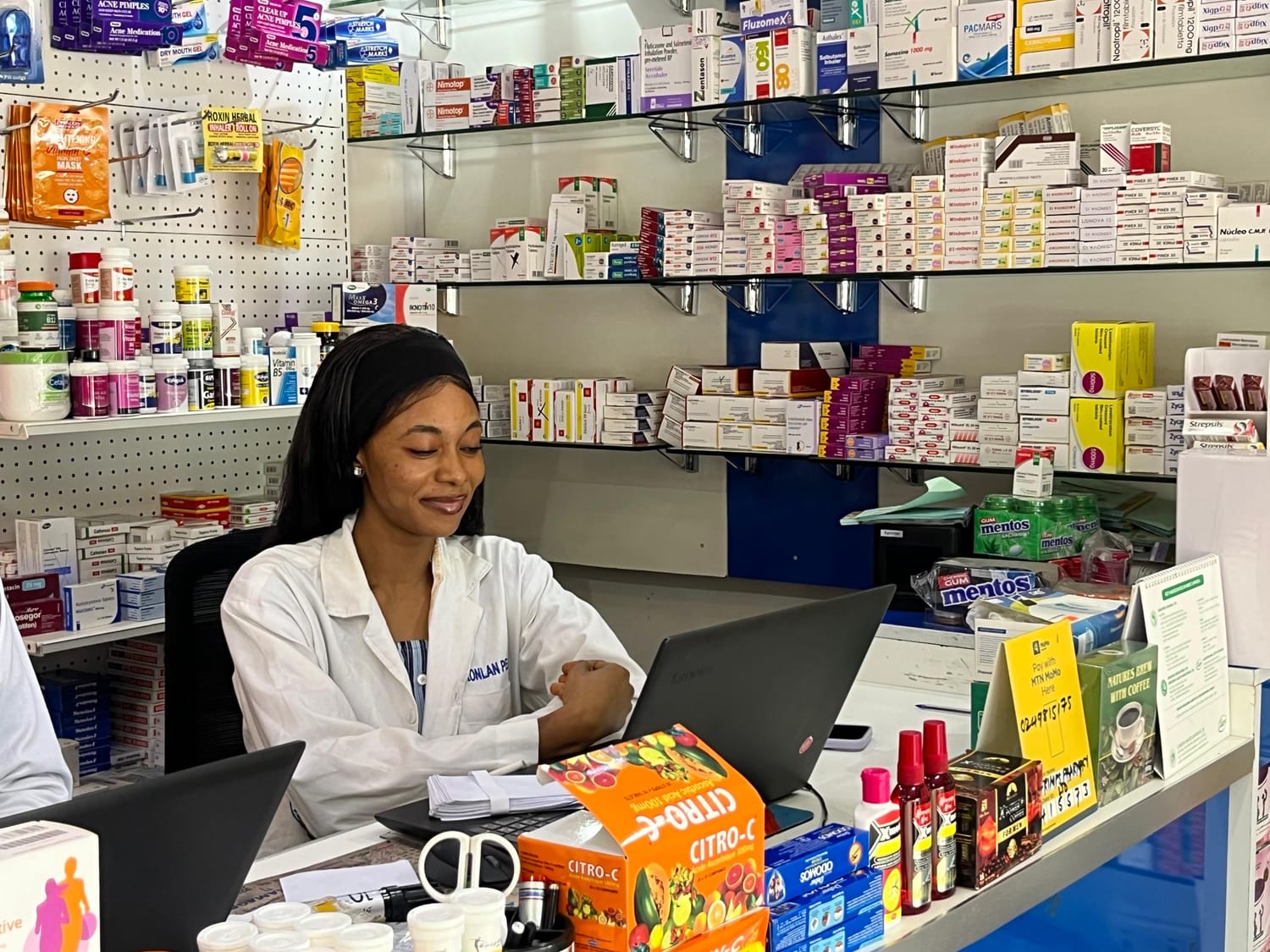 Pharmacist attending to a customer
