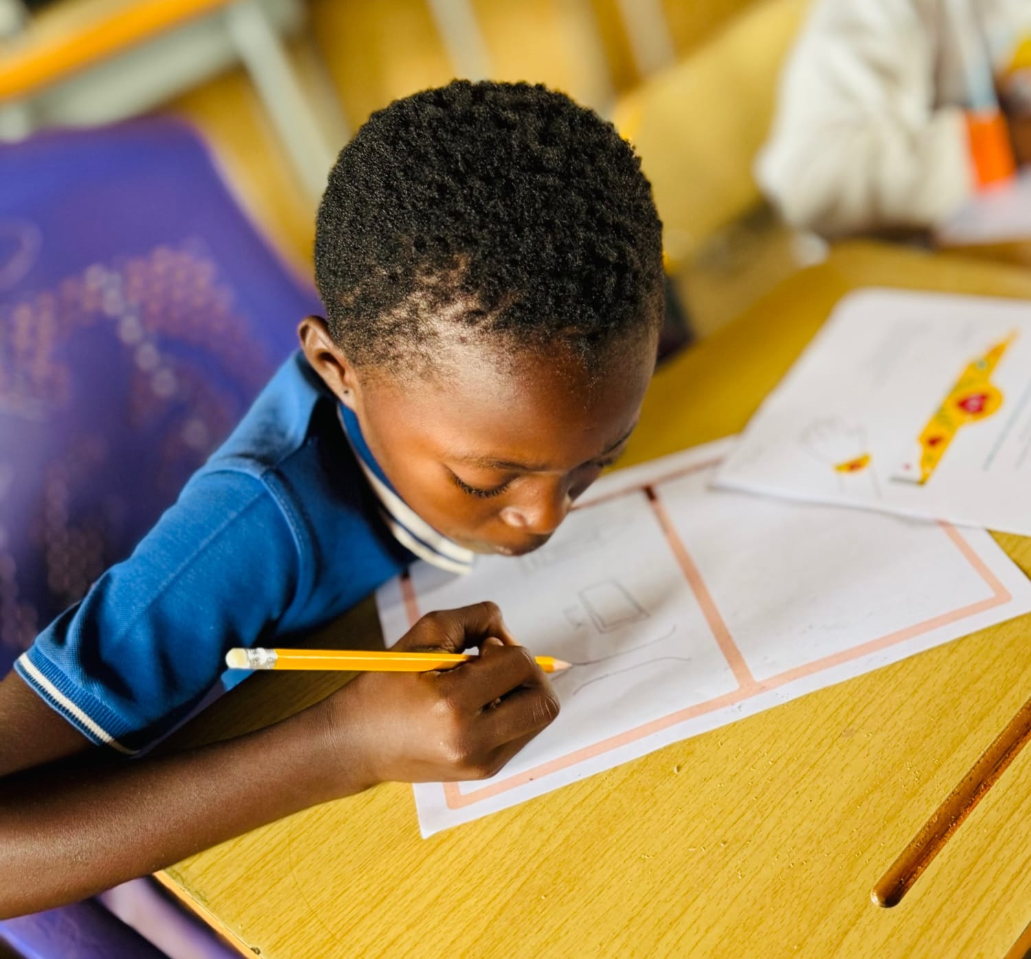 Girls participating in literacy and reading activities