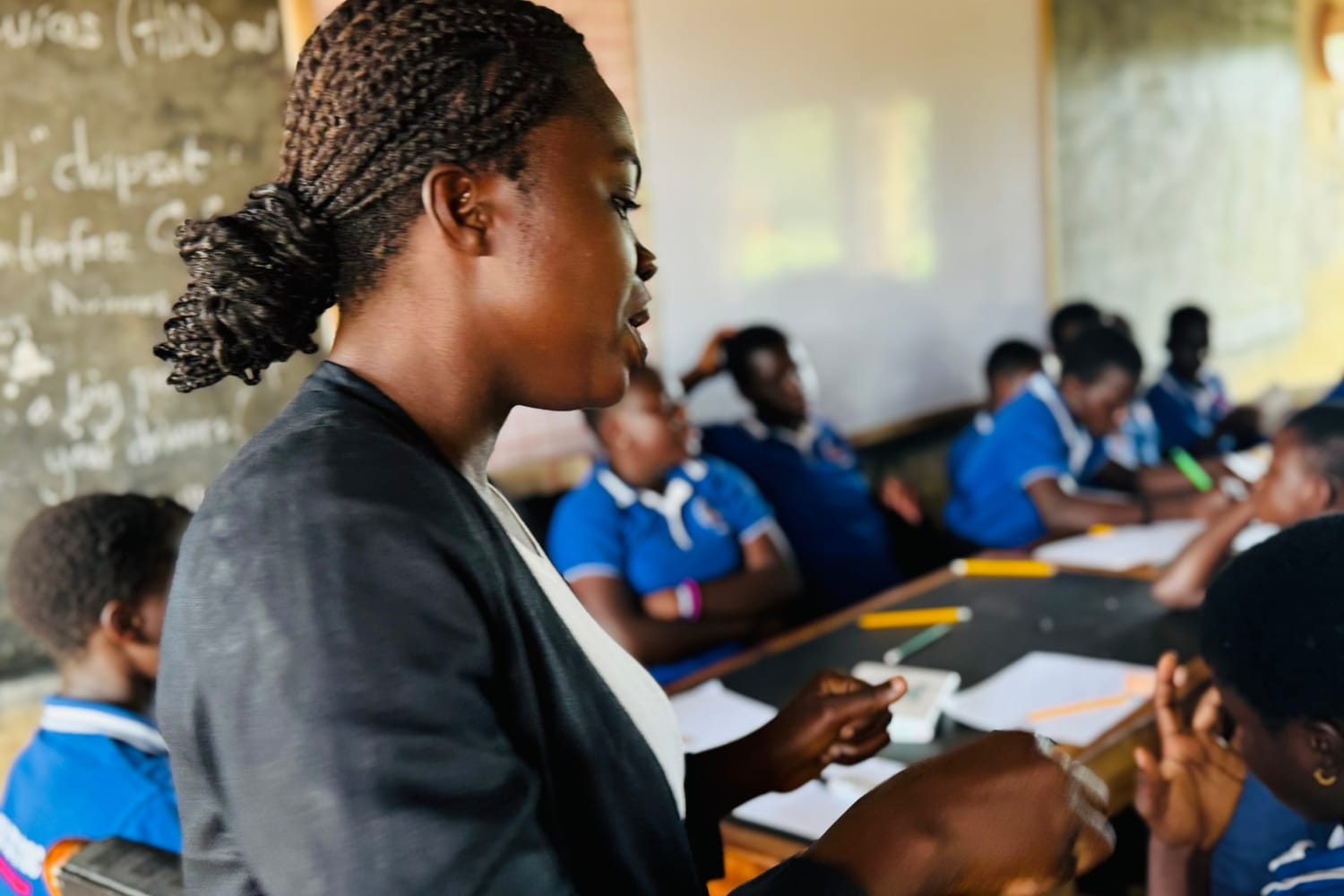A mentor supporting a young woman through mentorship and education