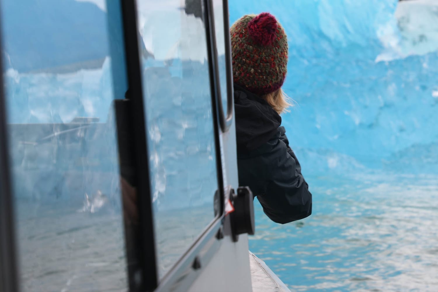 Photographing blue ice in LeConte Bay fjord during glacier photo tour by FauneVoyage Tours in Petersburg, Alaska