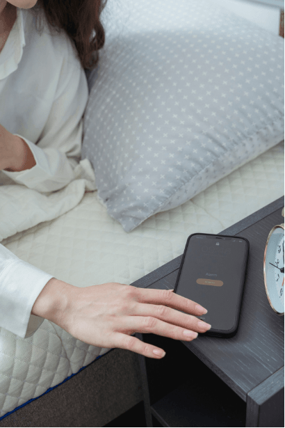 Reaching for phone in the morning