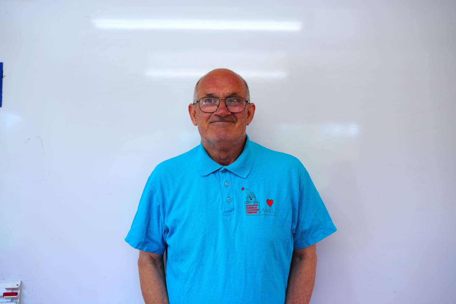 Hans van der Sluys lachend