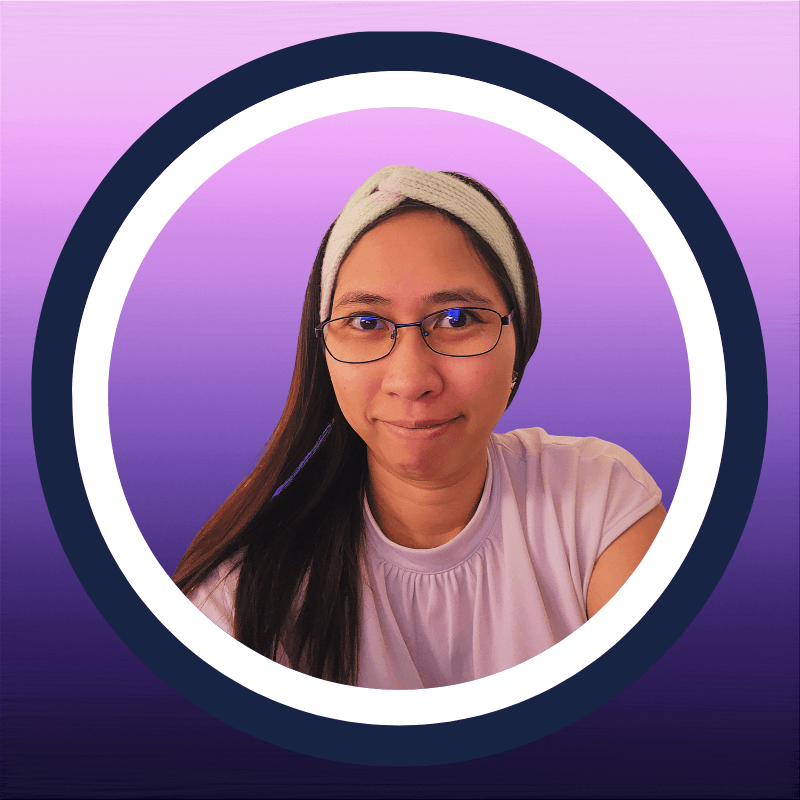 lady wearing glasses in purple background