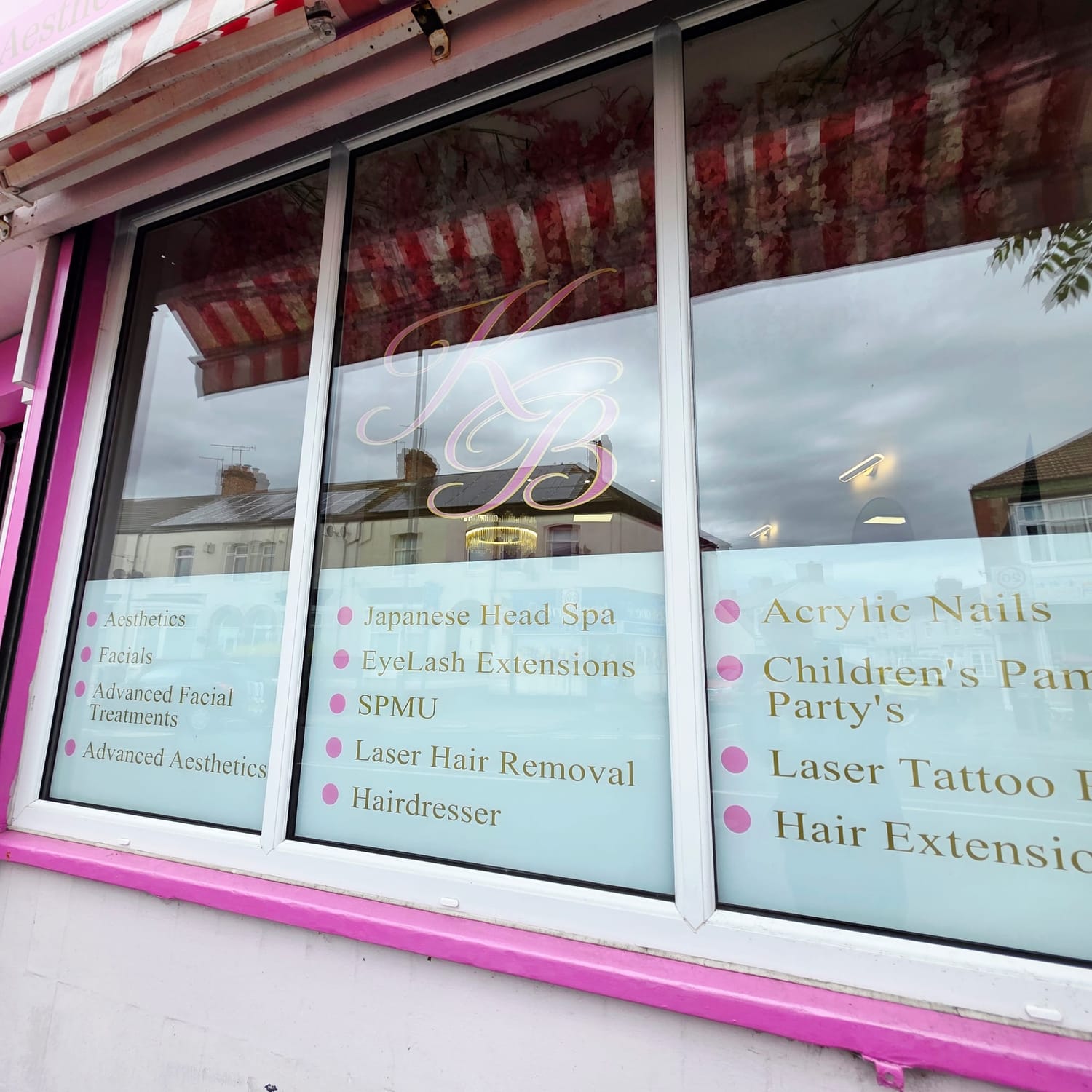 Kizzy b's salon window stickers by sticker man