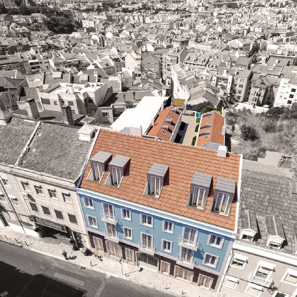 Vista aérea do Barão 65 com edifício residencial em destaque em Lisboa