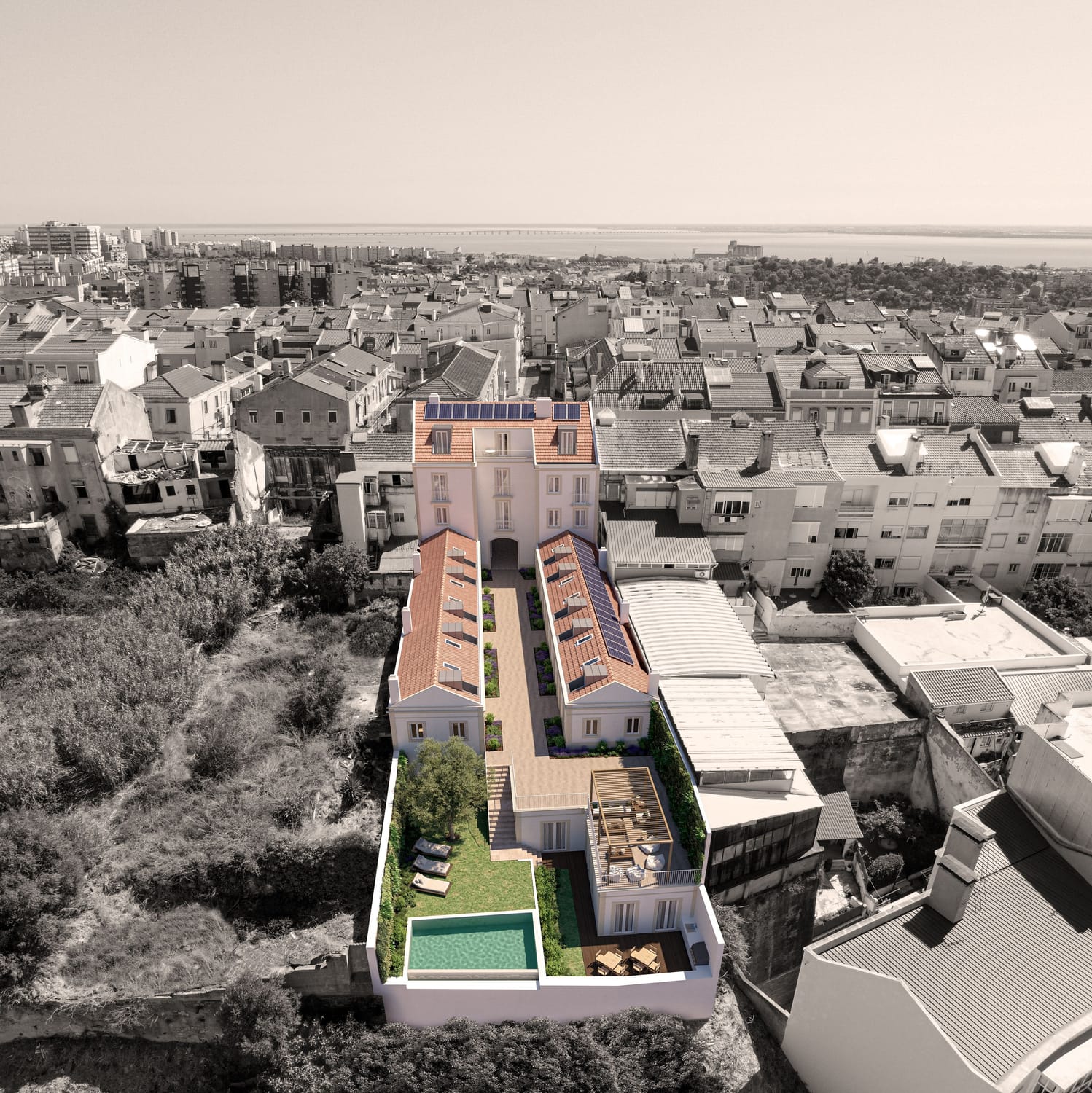 Vista aérea do Barão 65 com piscina e villas privadas em Lisboa