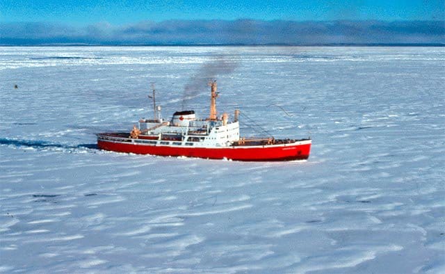 Eric Pittman on a Canadian Coast Guard patrol boat, the setting where he first committed to using his lens for conservation.