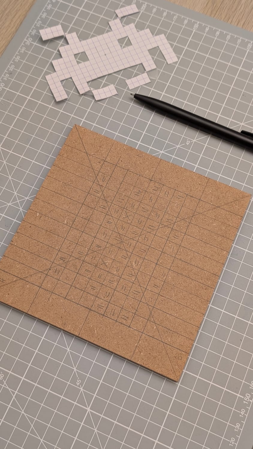 tableau pixel art en marqueterie de paille